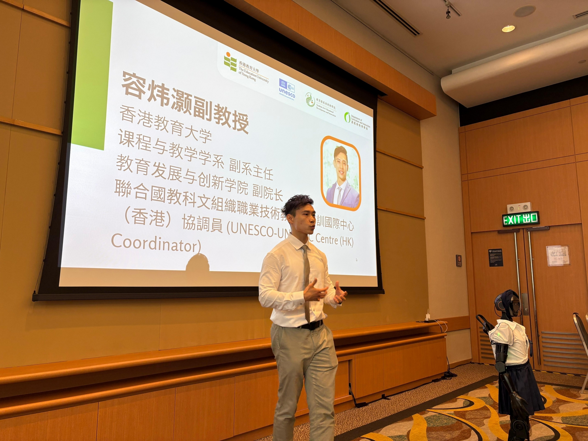 A person giving a presentation in front of a group of peopleAI-generated content may be incorrect.