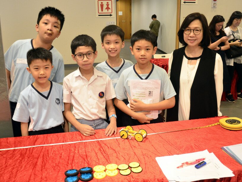 Professor Winnie So is pictured with the participating school team members.