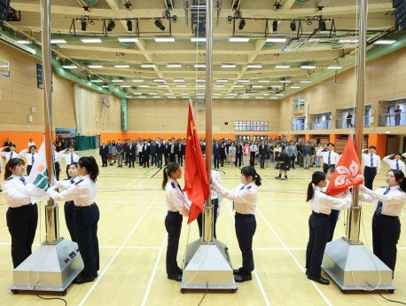 A team formed by EdUHK students raises the national, regional and university flags during the ceremony