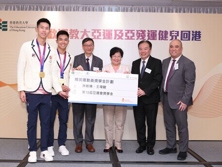 Scholarships are presented to the medallists: Wong Wai-chun, Lam San-tung (rowing)