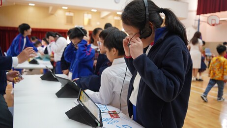 Students from HHCKLA Buddhist Wong Cho Sum School use ‘Fun to Chinese Poetry’