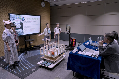 Participants present their innovative AI solutions in pitch session