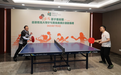Dr Sze (right) and Dr Fong (left) demonstrate their skills with a special table tennis racket