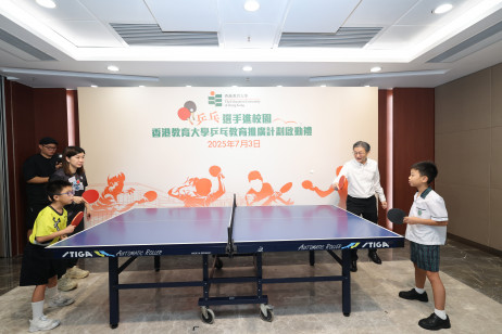 Miss Lee and Mr Yue led the primary students to play table tennis 