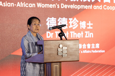 President of the Myanmar Women’s Affairs Federation delivers a speech