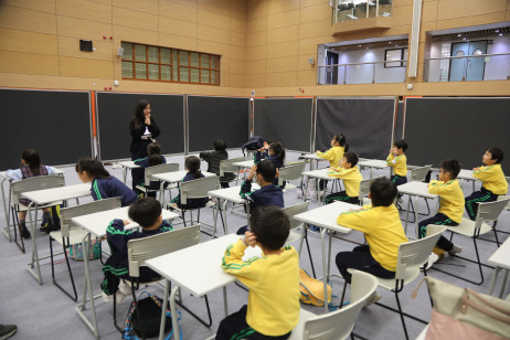 Students from Tai Po Baptist Public School resume classes at the Temporary Support Centre