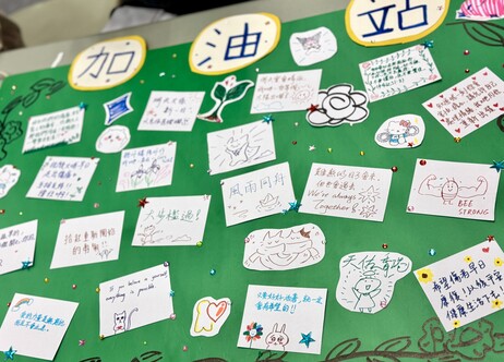 EdUHK students write cards of encouragement to support those affected by the fire