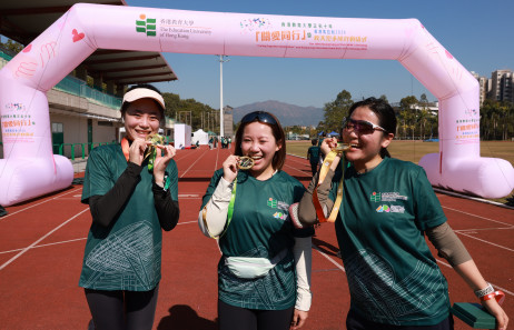Participants receive the medal after completing the 4.5 km walk