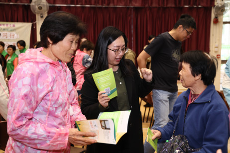 Project staff hand out project brochures in the district and brief older adults on the two new features: hearing screening and the “AI Smart Diet Analysis” application