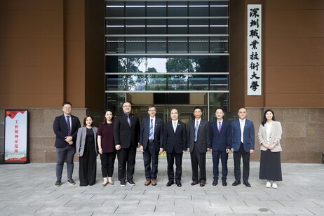 Group photo of the EdUHK delegation in front of the School of Artificial Intelligence building at Shenzhen Polytechnic University