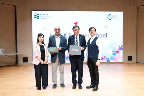Presentation of souvenirs of President Professor John Lee Chi-kin and Dr Rashid Al Riyami of the United Arab Emirates University, with Vice President (Academic) Professor May Cheng May-hung and Acting Director of Global Affairs Professor Lee Kwai-sang