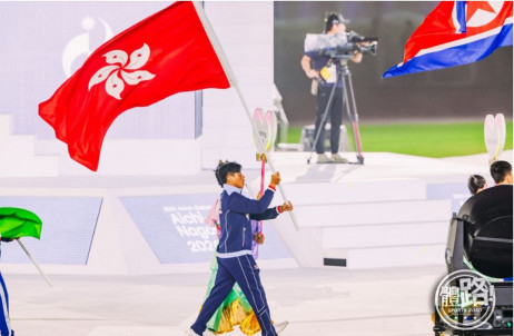 Student-athlete Cado Lee as a flag bearer for Hong Kong, China at the Asian Games’ closing ceremony (Photo Source: Sportsroad)