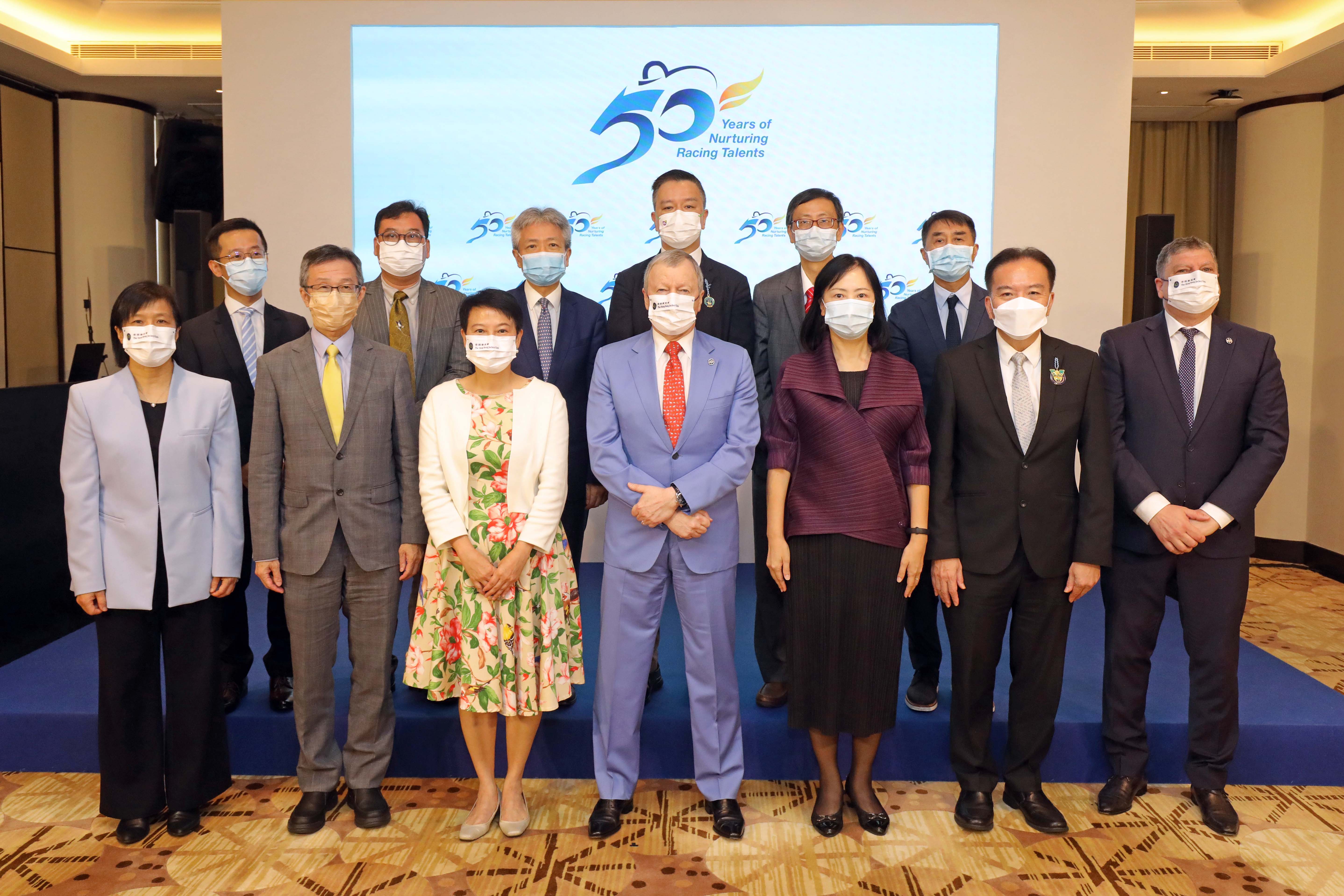 EdUHK Council Chairman Dr David Wong Yau-kar (front row: second from right); President Professor Stephen Cheung (second row: third from left); Professor John Lee (second row: second from right); and Dr Andy Tse pictured with Permanent Secretary for Education of HKSAR Government Ms Michelle Li (front row: third from right) and the HKJC senior management 