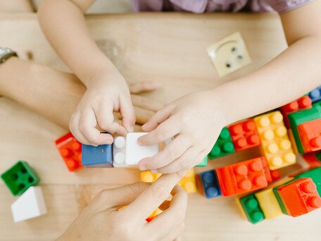 Enhancing emotion understanding and theory of mind via block building