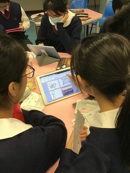 Students designing comic strips about the Hong Kong version of the story